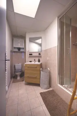 a bathroom with a toilet and a sink and a shower at Nouveau charmant Studio à 5 Minutes de la mer in Nice
