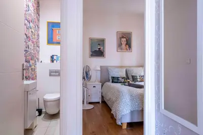 a small bedroom with a bed and a toilet at Beautiful Provencal apartment, fully equipped, beach 300m away - FONTAINE 3 in Nice