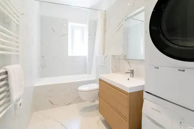 a white bathroom with a toilet and a sink at Maison Bianchi - Downtown Nice Pertinax in Nice