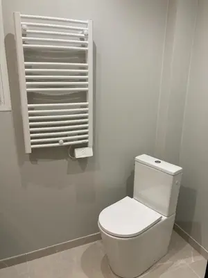 a bathroom with a white toilet in a room at Appartement moderne proche mer et transports in Nice
