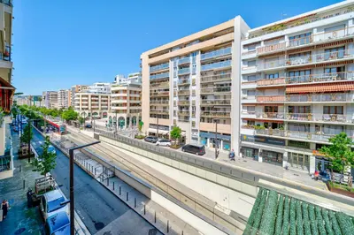a view of a city with buildings and a street at Studio moderne proche mer - Balcon et Climatisé in Nice