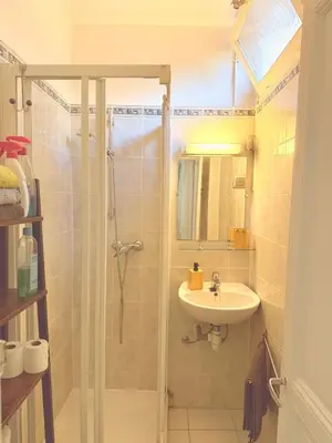 a bathroom with a shower and a sink at 3 pièces près du Port de Nice in Nice
