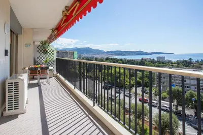 a balcony with a view of a city at ALTAIR AP4466 by RIVIERA HOLIDAY HOMES in Nice