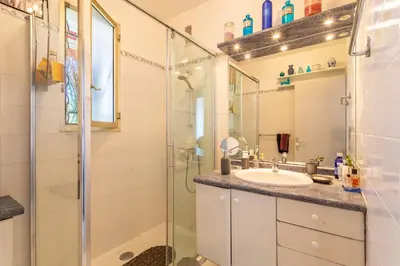 a bathroom with a shower and a sink at ALTAIR AP4466 by RIVIERA HOLIDAY HOMES in Nice