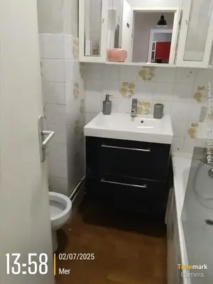 a bathroom with a sink and a toilet at l'Or dans la Mer Partner in Nice