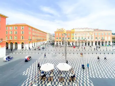 a plaza in a city with people and buildings at Place Massena 4 Pers AC WiFi in Nice