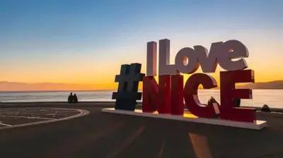 a sign that says love is needed at the beach at Appartement moderne & calme proche mer et centre in Nice
