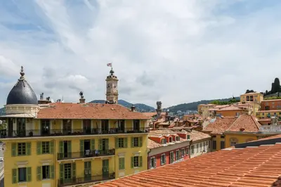 a view of a city with a clock tower at 12, Boulevard Jean Jaures - Studio in Nice