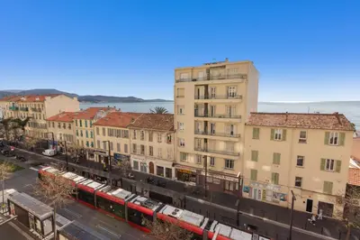 a plastic container filled with spoons and forks and knives at L'Azur - Seaview - AC - Tram - WIFI - Airport in Nice