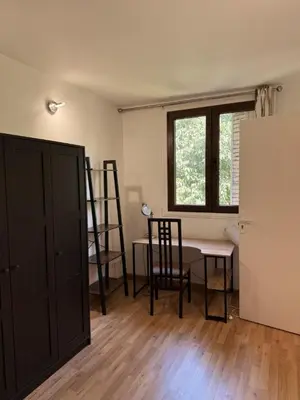 a room with a table and chairs and a window at Big Apartement 20 min from beach in Nice