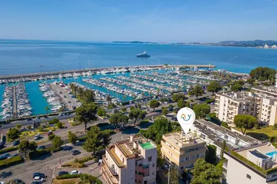 an aerial view of a marina with a lot of boats at Castel du Port - Happy Rentals in Saint-Laurent-du-Var