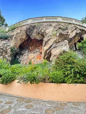 a rock wall with a bridge on top of it at Green Heaven Apt, Rickeys in Cap d'Ail