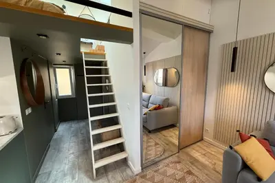 a room with a loft bed and a living room at Nice studio in the heart of Old Nice - 4 pers in Nice