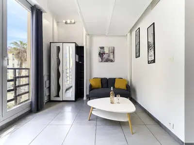 a living room with a couch and a table at Hyper Center - Superb Studio - Cozy - Wifi in Nice