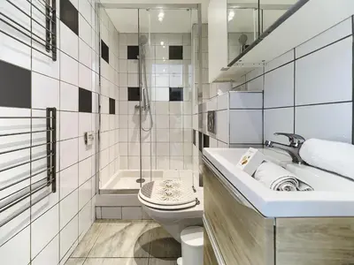 a white bathroom with a sink and a toilet at Hyper Center - Superb Studio - Cozy - Wifi in Nice