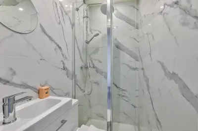 a bathroom with a shower and a sink at Magnifique studio en plein centre de Nice in Nice