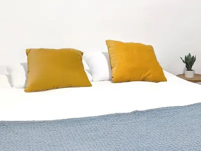 a bedroom with a dressing table and a mirror at WeHost - MALONAT - Urban Cocoon # Old Town & Beaches in Nice