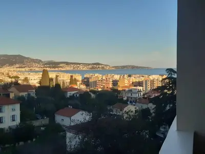 a view of a city with the ocean and buildings at Nice Signature Caucade in Nice
