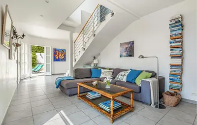 a living room with a couch and a table at Beautiful Home In Eze in Èze