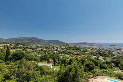 a view of a city from a hill at VILLA MONTE CRISTO - Villa conviviale a Nice - Superbe vue, piscine et jeux en plein air in Nice