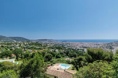a view of the city from a house at VILLA MONTE CRISTO - Villa conviviale a Nice - Superbe vue, piscine et jeux en plein air in Nice