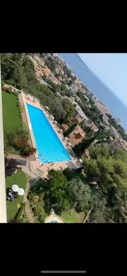 an aerial view of a large swimming pool at Elegant apartment a Nice, Sea View in Nice