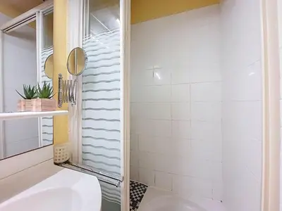 a bathroom with a sink and a shower at Apartment Daphné by Interhome in Nice