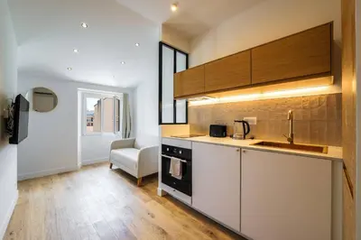 a kitchen with a sink and a stove top oven at Magnifique studio boulevard Gambetta - B in Nice