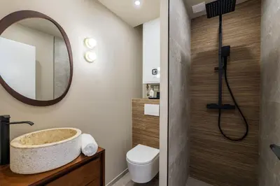a bathroom with a sink and a toilet and a mirror at Magnifique studio boulevard gambetta - A in Nice