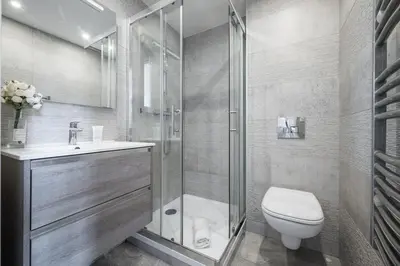 a bathroom with a shower and a toilet and a sink at Soleil Sucré - Splendid cocoon near Jean Médecin in Nice