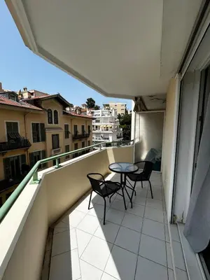 a bathroom with a shower and a toilet and a sink at Studio bord de plage à Nice in Nice