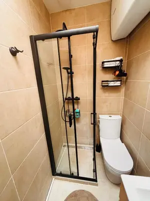 a shower stall with a toilet in a bathroom at Coin d'Amour Gambetta in Nice