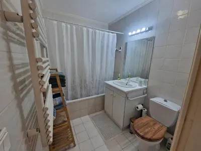 a small bathroom with a toilet and a sink at Renoir SeaSide Apartment in Nice