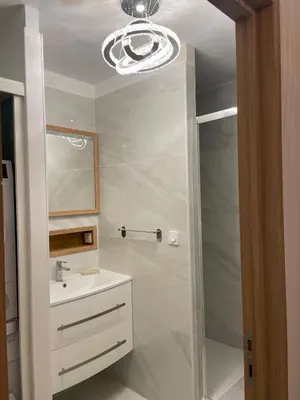 a bathroom with a white sink and a shower at Recently renovated apartment in quiet area in heart of Old Nice in Nice