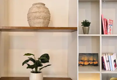 a shelf with a plant and a vase on it at Nestor&Jeeves - NISSA - Central location in Nice
