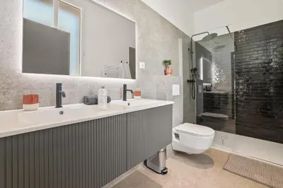 a bathroom with a sink and a toilet and a shower at Central Luxurious Property in Antibes