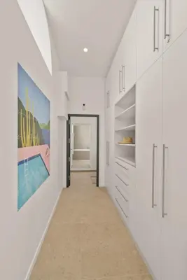 a hallway of a house with white walls at Central Luxurious Property in Antibes