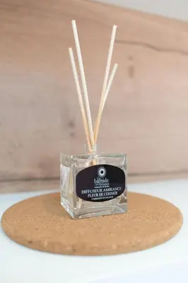a jar with sticks in it sitting on a cork coaster at Le Toit d'Azur in Nice