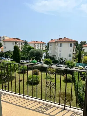 a balcony with a view of a parking lot at Appartement F2 Nice Ouest in Nice