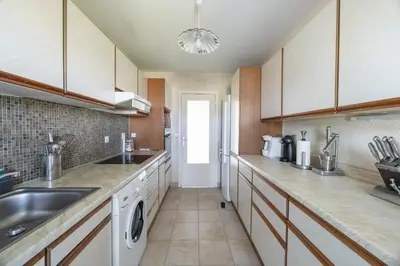 a kitchen with a sink and a dishwasher at Happyfew La Suite Nicerama in Nice