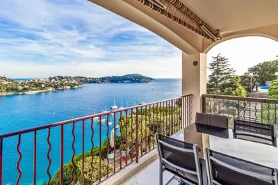 a balcony with a view of the water at Magnifique appartement avec vue mer époustouflante in Villefranche-sur-Mer
