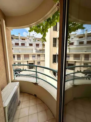 a balcony with a view of a building at Perle de Nice - 50 mètres de la plage, Clim, Wifi in Nice