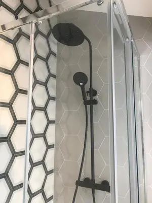 a shower in a bathroom with a glass wall at 1 bedroom, Best location in Nice in Nice
