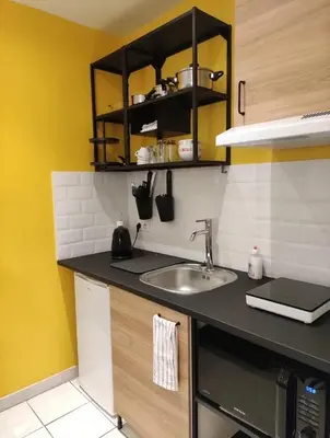 a kitchen with a sink and a counter top at Studio in the heart of Nice in Nice