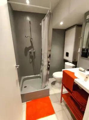 a bathroom with a shower and a toilet and a sink at Studio in the heart of Nice in Nice