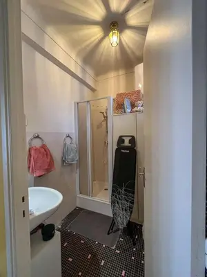 a small bathroom with a shower and a sink at 5 sky miniPenthouse in Nice