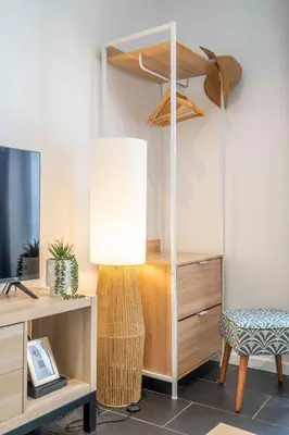 a room with a desk with a lamp and a chair at Modern and elegant, air-conditioned, city centre - HDP2 in Nice