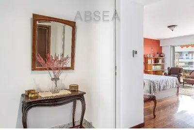a room with a table with a mirror and a bed at Absea Nice Belles Terres 4 in Nice