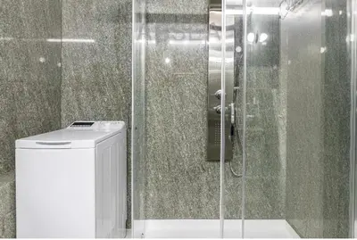 a glass shower in a bathroom with a toilet at Absea Nice Belles Terres 4 in Nice