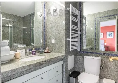 a bathroom with a toilet and a sink and a mirror at Absea Nice Belles Terres 4 in Nice
